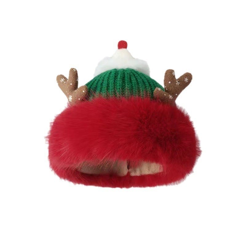 Groene gebreide kerstmuts met rendiergewei