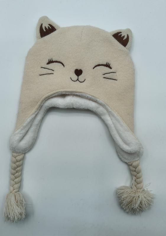 Crèmekleurige gebreide wintermuts met kattenoortjes