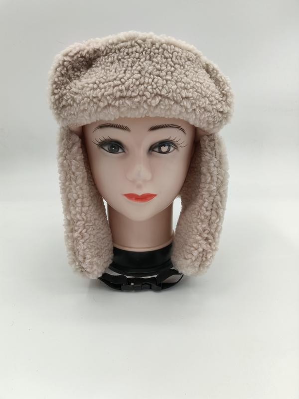 `Beige sherpa fleece trapper muts met oorflappen en kinband