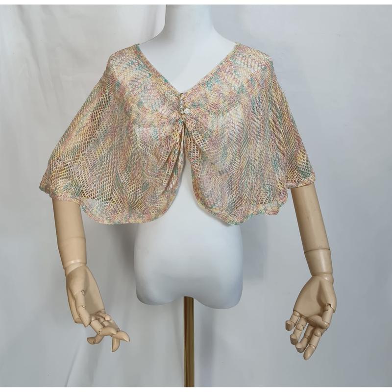 Pastel multicolor open-weave gebreide cape shawl met strass broche