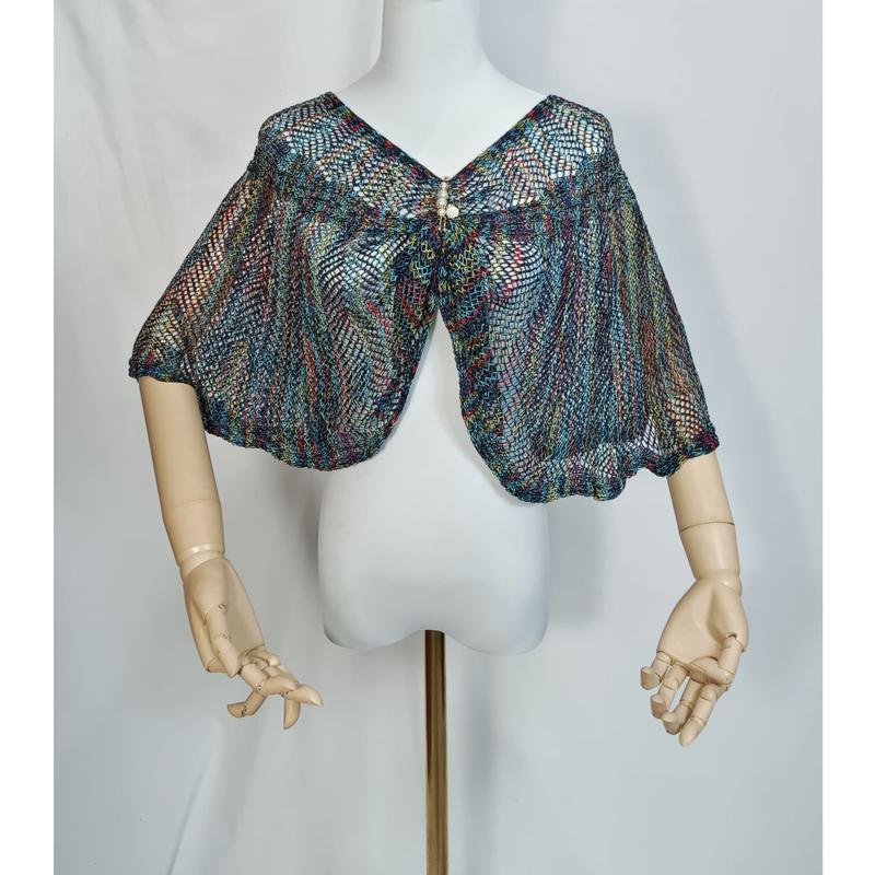 Meerkleurig gebreid capelet in teal