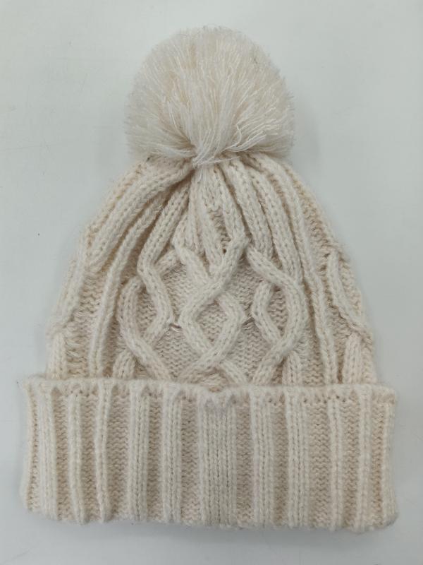 Crème grove gebreide wintermuts met pluizige pompom en geribbelde rand