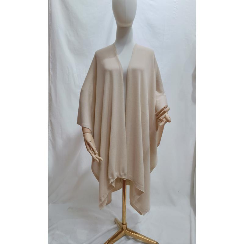 Beige oversized gebreide poncho cape met open voorkant en geribd zoomdetail