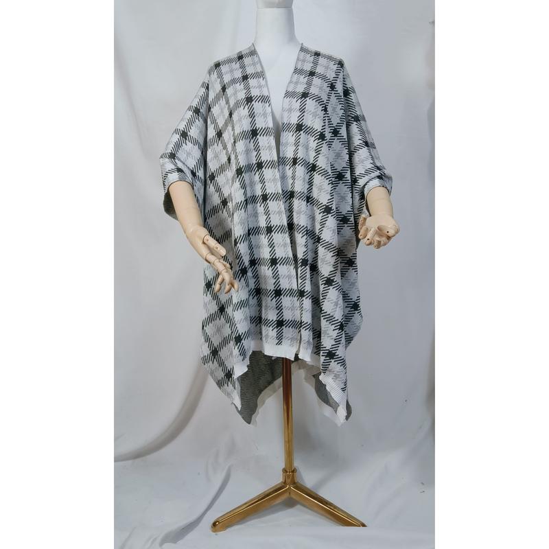 Zwart-wit houndstooth gebreide poncho cape met open voorkant