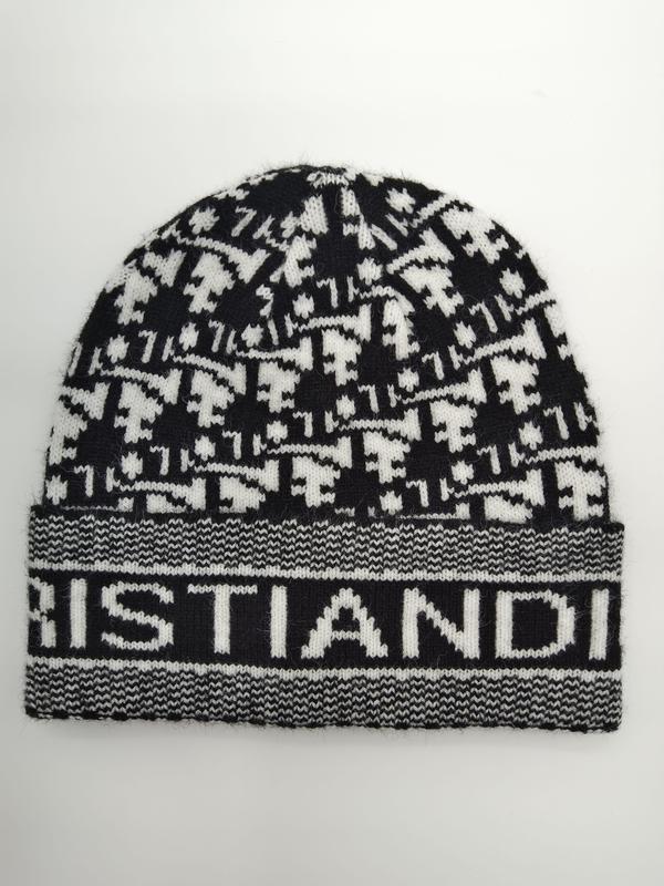 Zwart-witte houndstooth gebreide muts met geribbelde manchet met logo