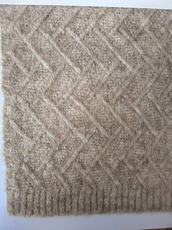Beige wollen plaid met diamant reliëf en geribbelde rand - groothandel deken leverancier