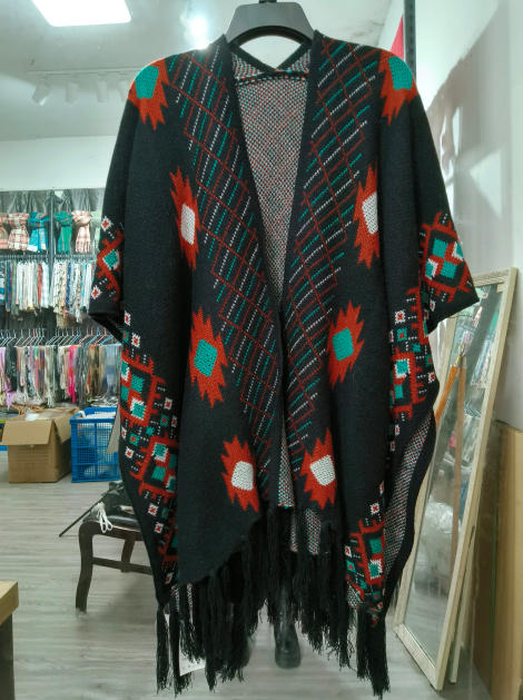 Zwarte gebreide poncho cape met teal
