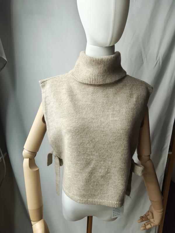 Beige mouwloze coltrui gebreide vestjurk met zijstrikken